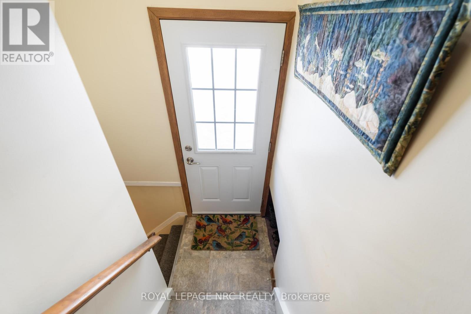 Stairs to Lower Level and Backyard