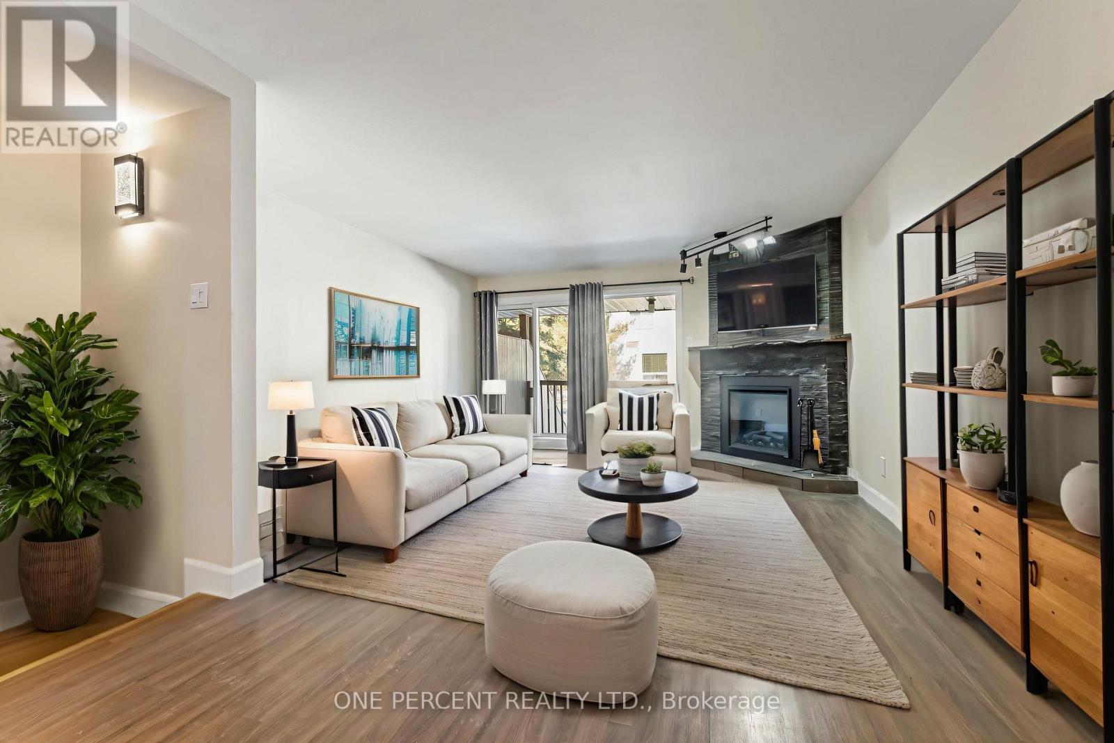 Digitally staged Living room with new electric FP