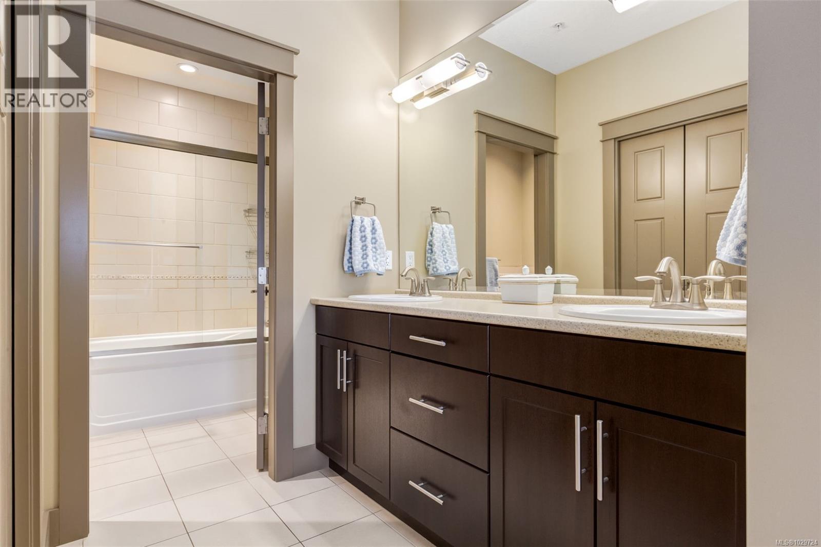 #102 5418 JACOBS LANE - 27