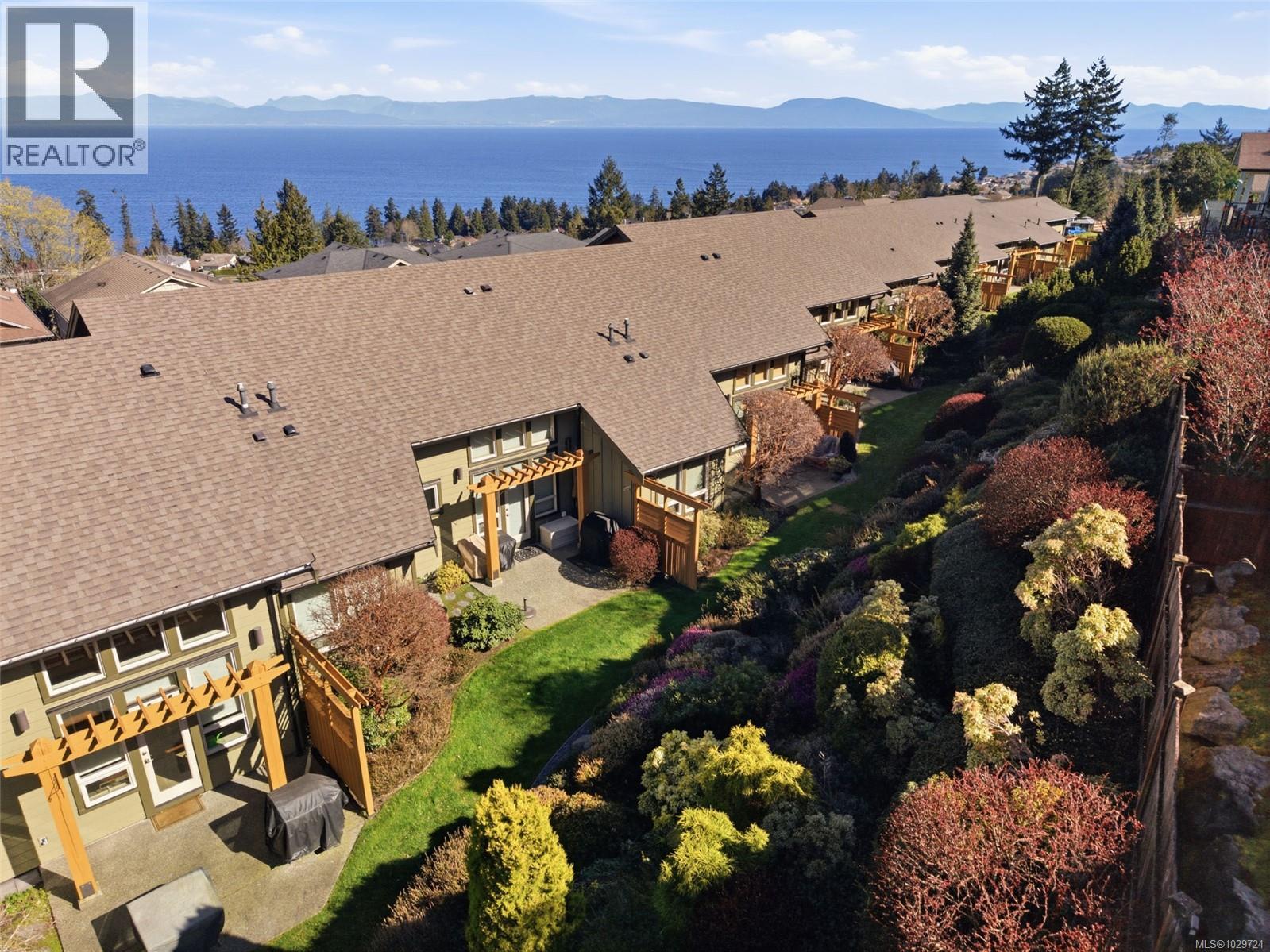 #102 5418 JACOBS LANE - 65