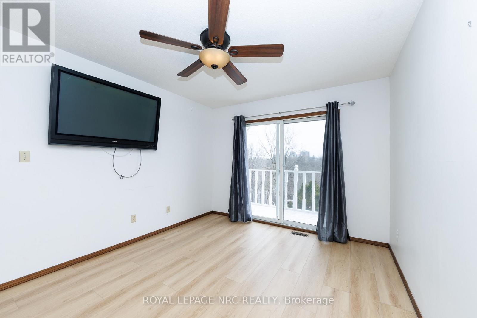 Primary bedroom w/ patio