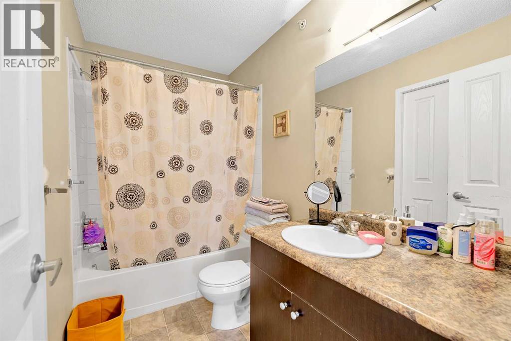 1421, 1140 Taradale Drive NE photo 11