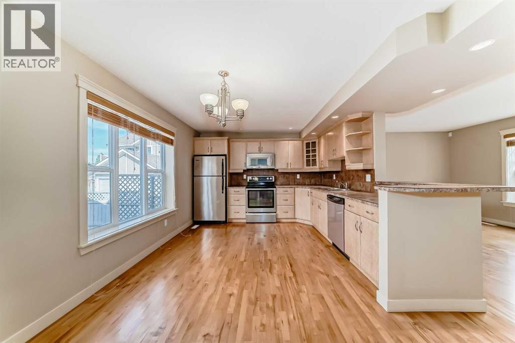 Single Family House for Sale in  Ypres Green SW Garrison Woods Calgary 