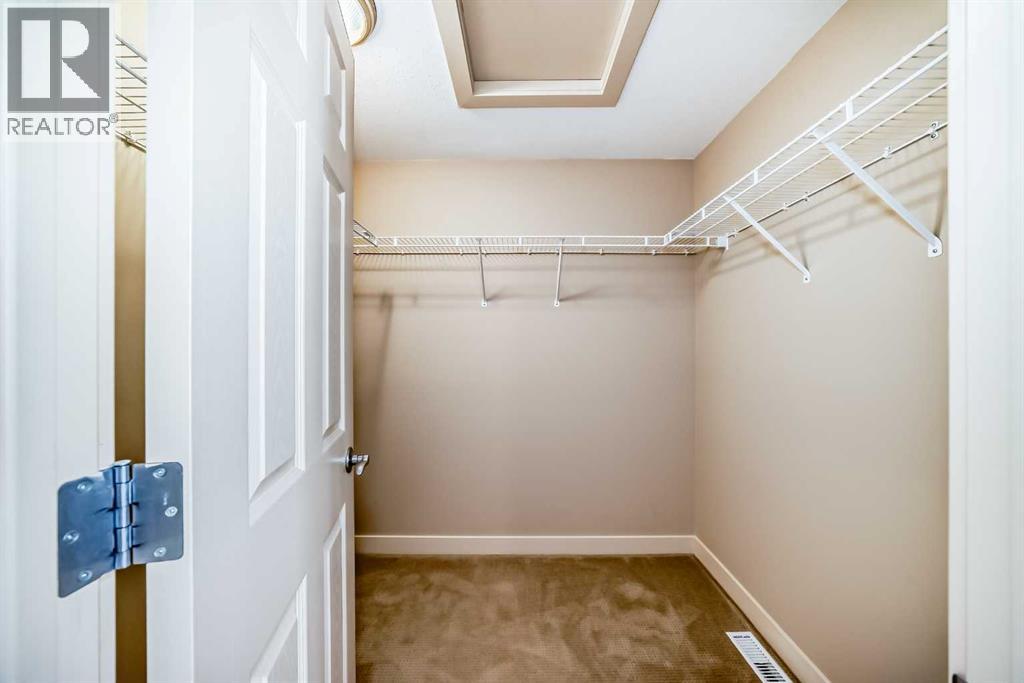 Single Family House for Sale in  Ypres Green SW Garrison Woods Calgary 