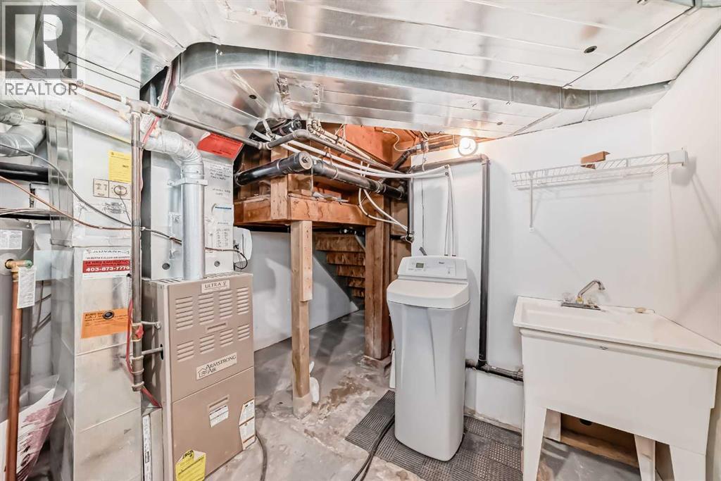 Single Family House for Sale in  Ypres Green SW Garrison Woods Calgary 