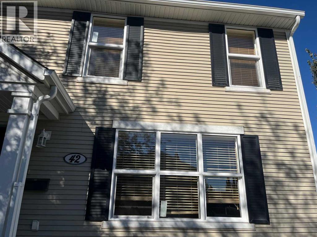 Single Family House for Sale in  Ypres Green SW Garrison Woods Calgary 