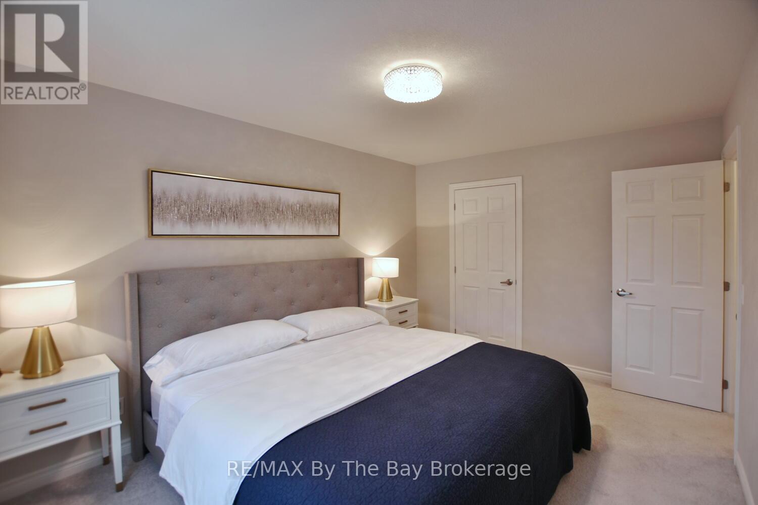 Primary Bedroom with Walk Closet and Laundry Area