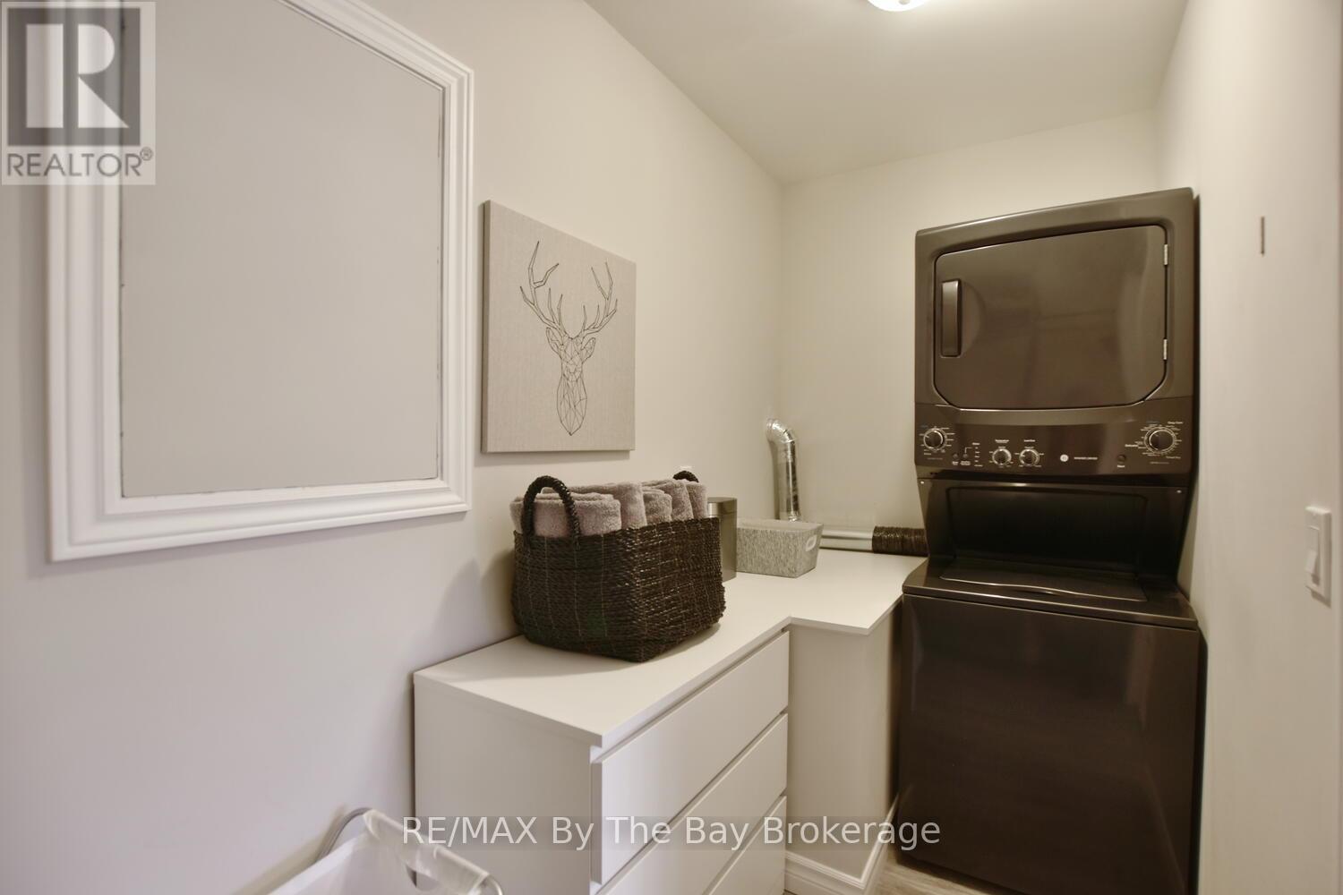 Walk In Closet with Laundry Area