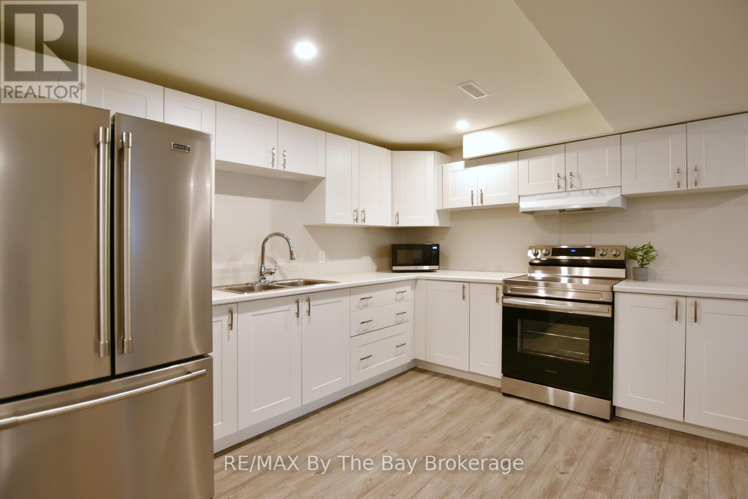 Apartment Kitchen with Stainless Appliances