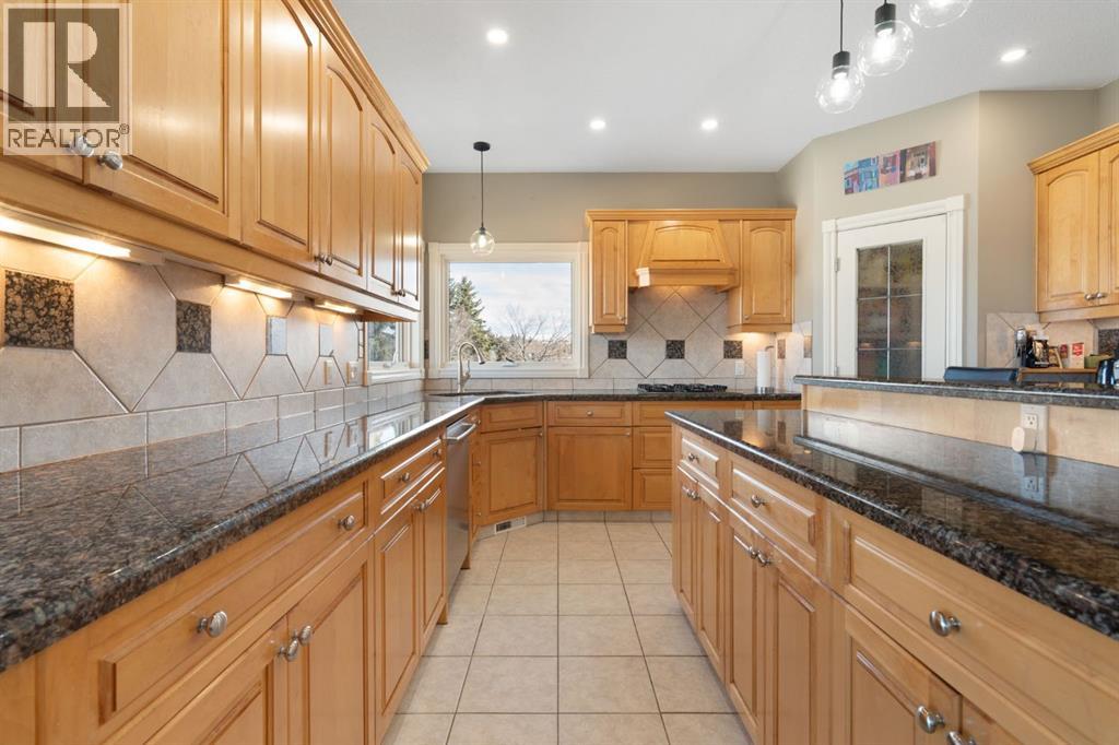 Single Family House for Sale in  Arbour Estates Green NW Arbour Lake Calgary 