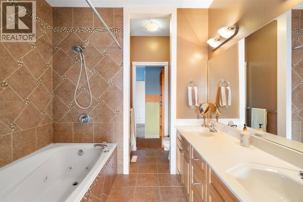 Single Family House for Sale in  Arbour Estates Green NW Arbour Lake Calgary 