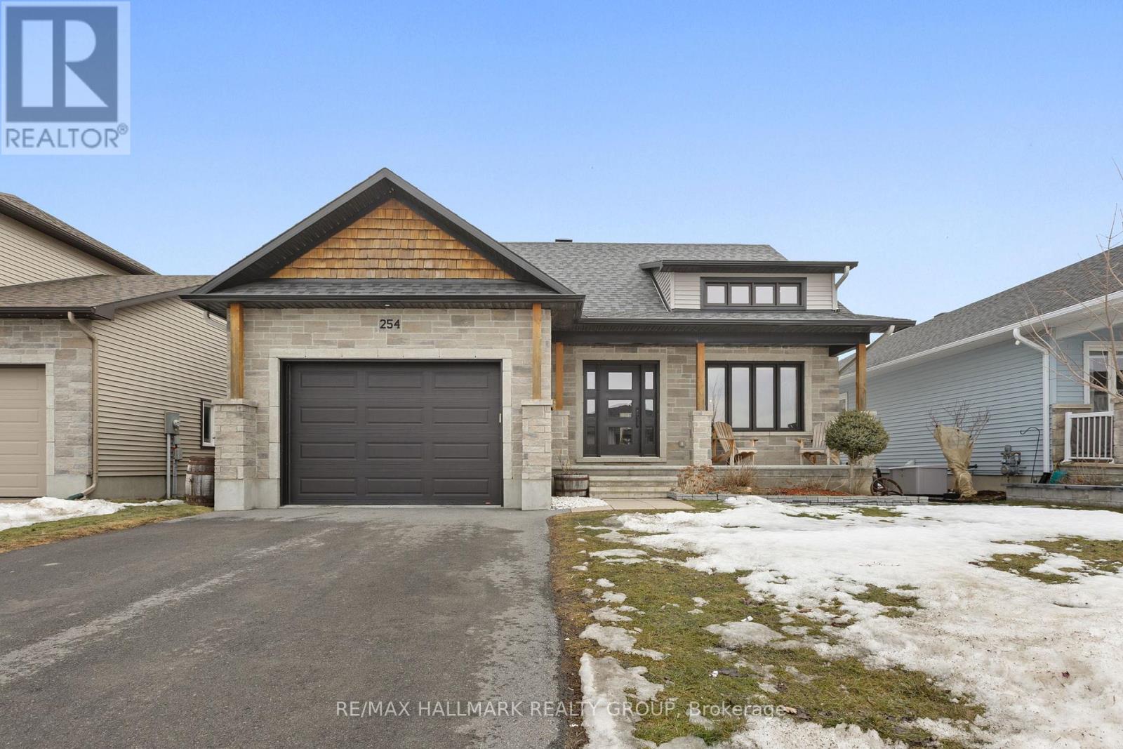 Front view with double driveway & garage