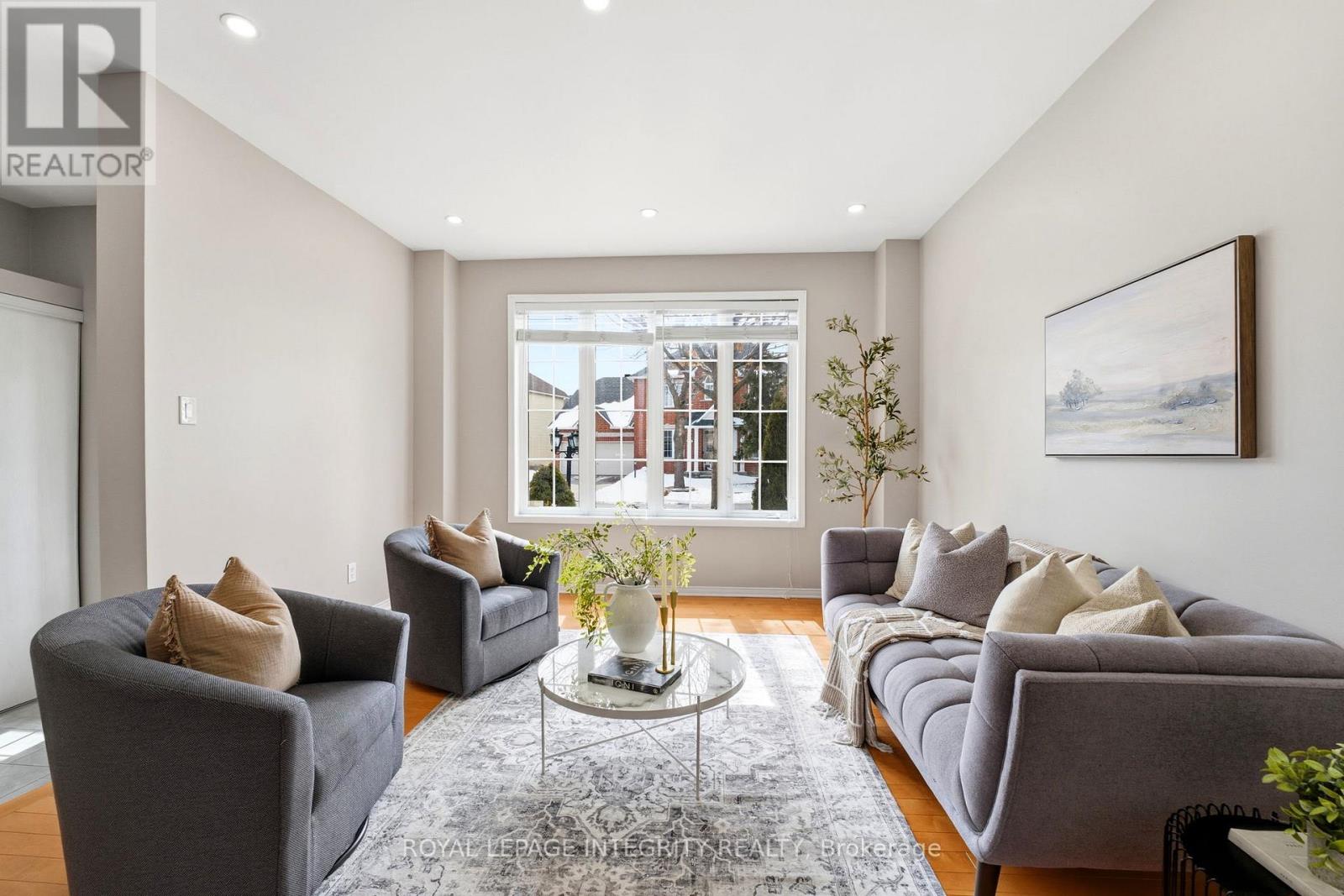 Bright front living room with added pot lights