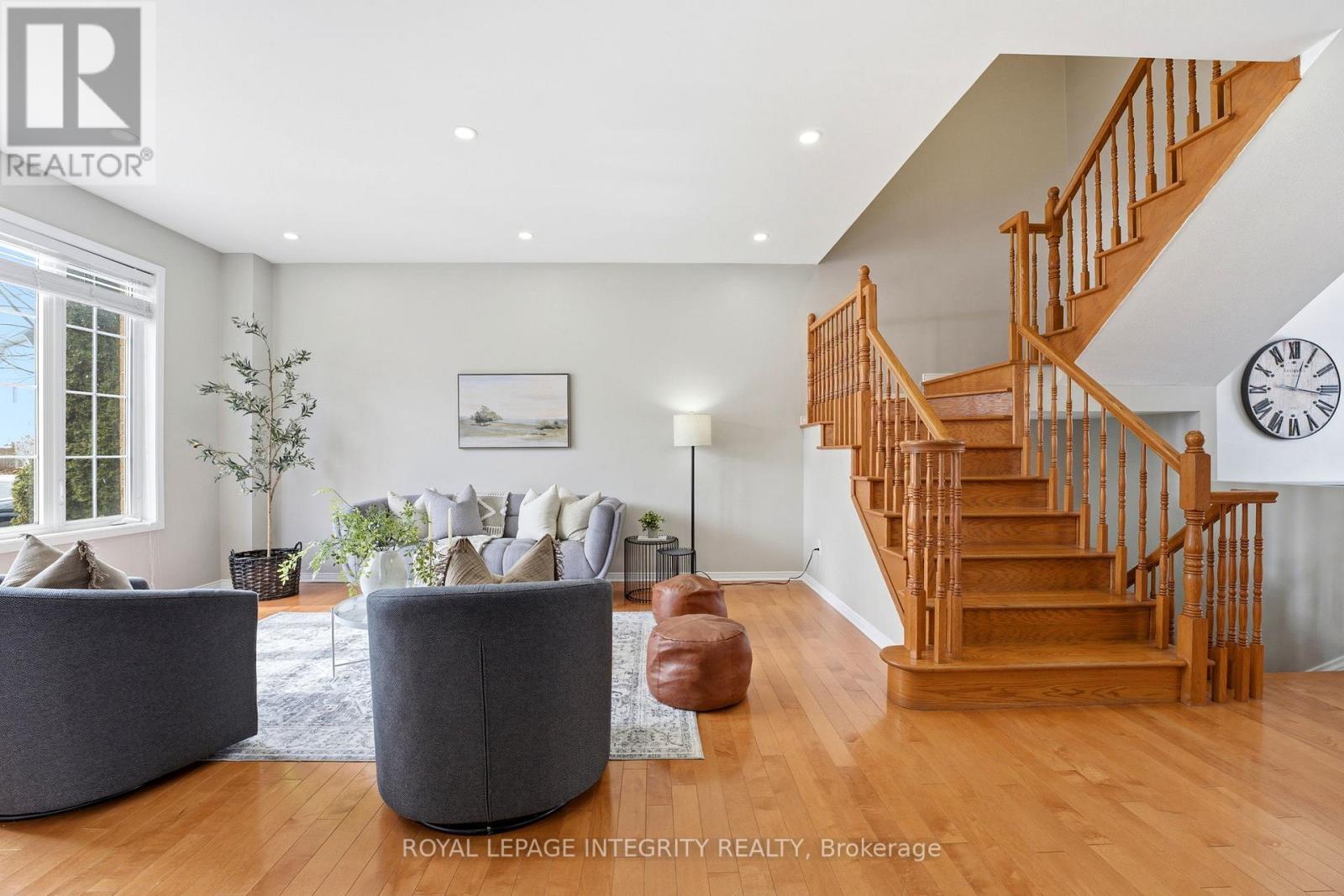 Hardwood flooring and elegant hardwood staircase