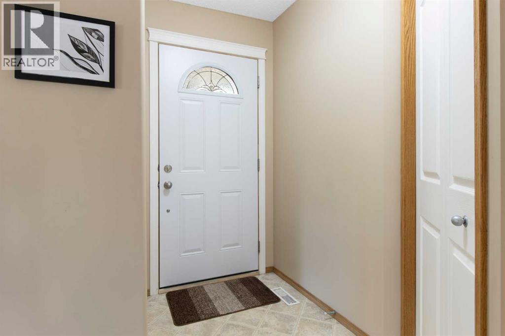 Single Family House for Sale in  Everwillow Close SW Evergreen Calgary 