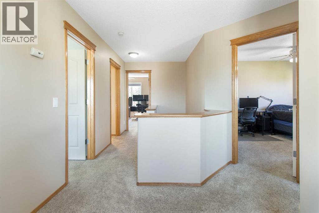 Single Family House for Sale in  Everwillow Close SW Evergreen Calgary 