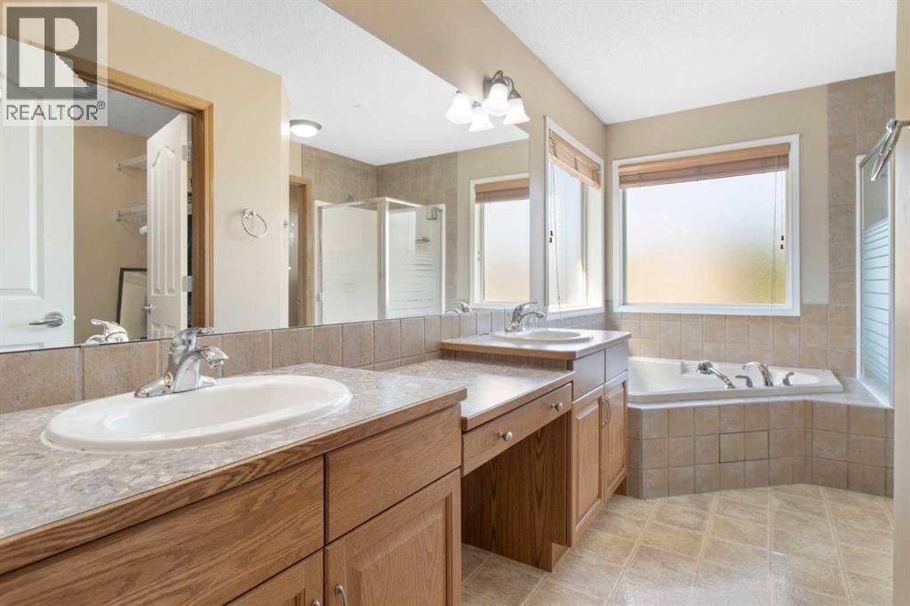 Single Family House for Sale in  Everwillow Close SW Evergreen Calgary 