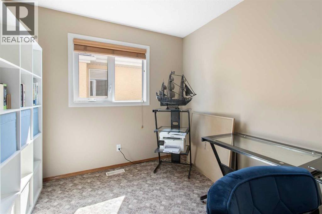 Single Family House for Sale in  Everwillow Close SW Evergreen Calgary 