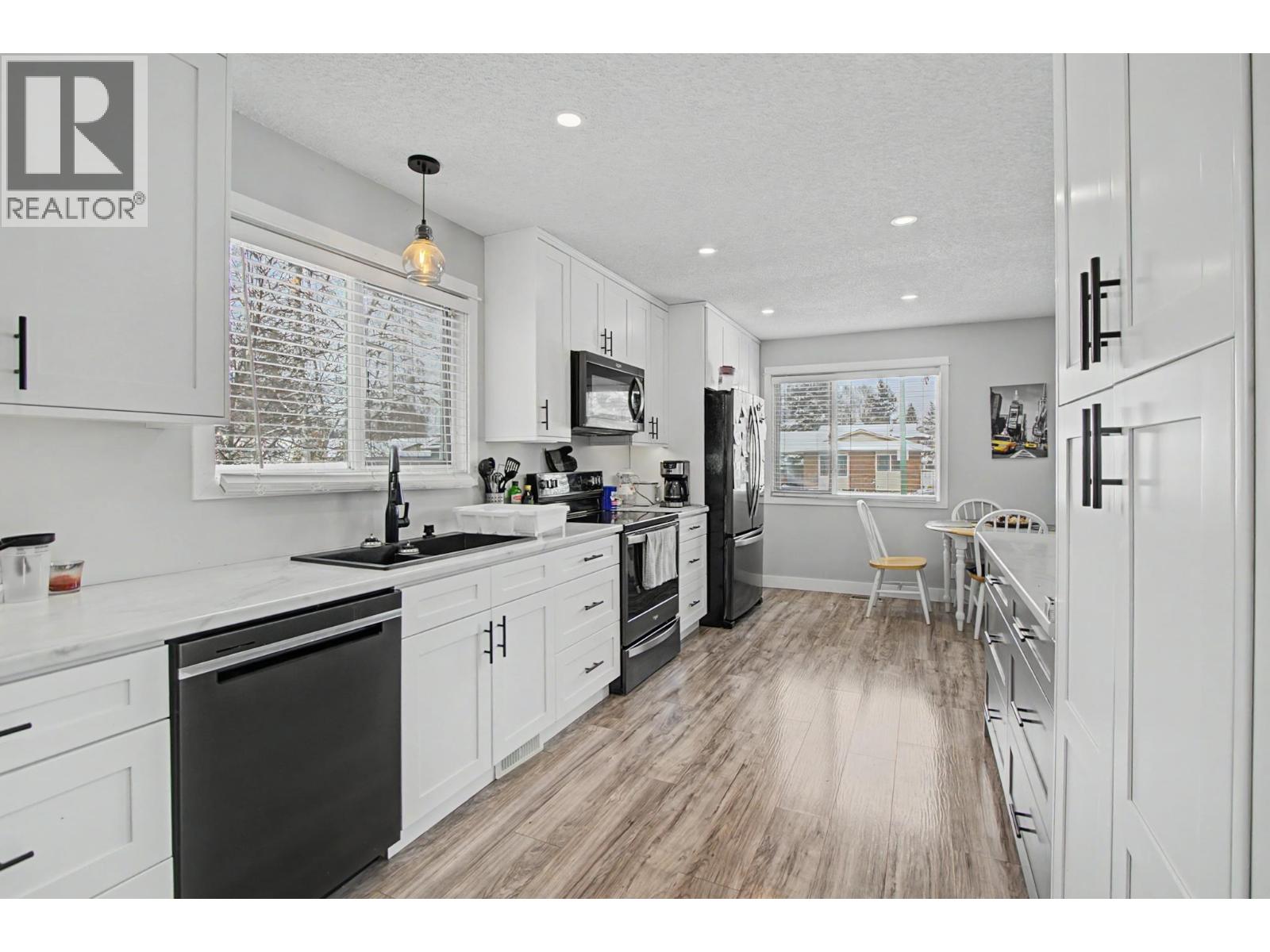 7741 LANCASTER CRESCENT - 7