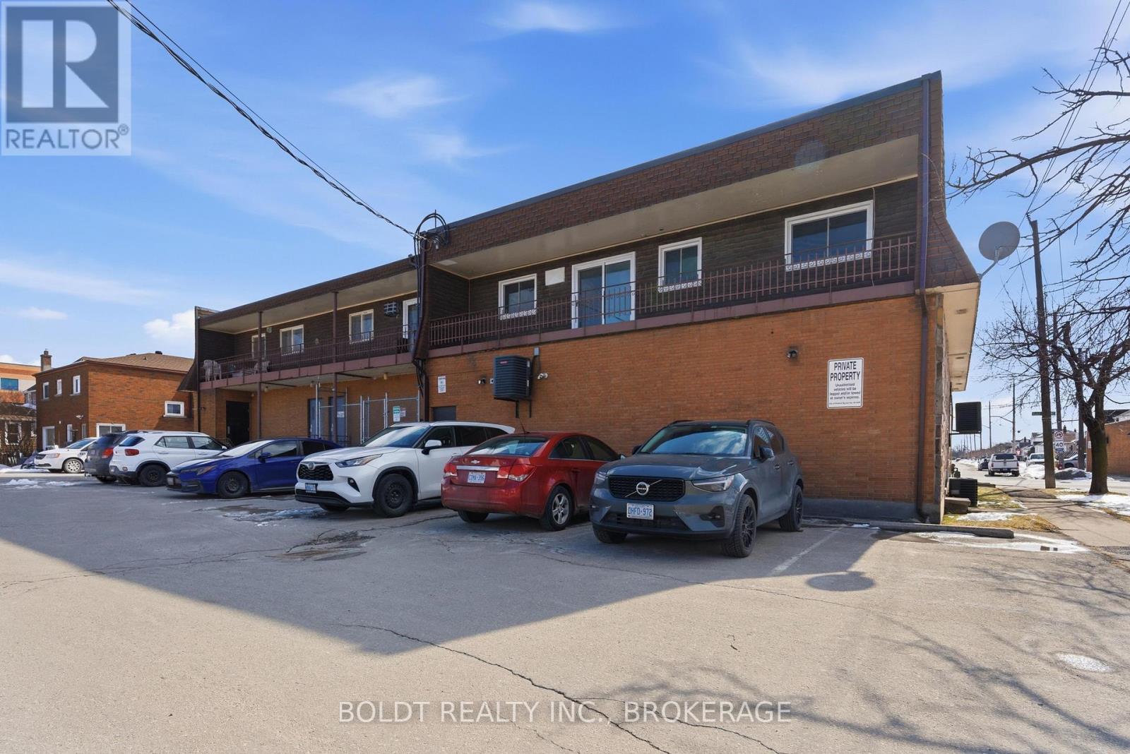 F - 706 MAIN STREET E