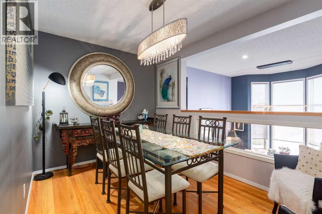 Single Family House 4 Level for Sale in  Hawkstone Manor NW Hawkwood Calgary 