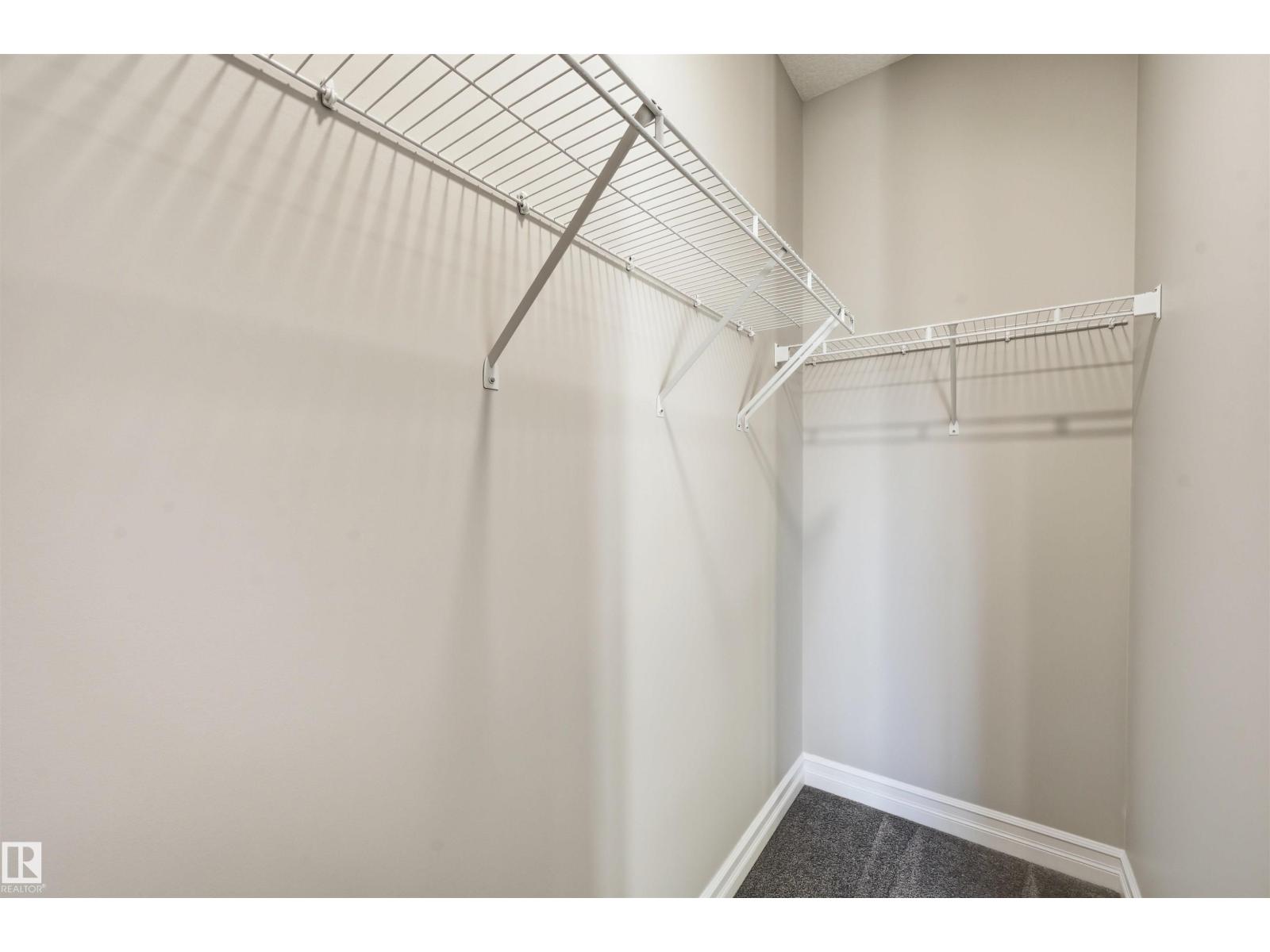 
          10 804 WELSH Drive SW
            <br/>
            <span>Edmonton</span>
            , 
            <span>AB</span>
             <span>T6X1Y8</span>
        