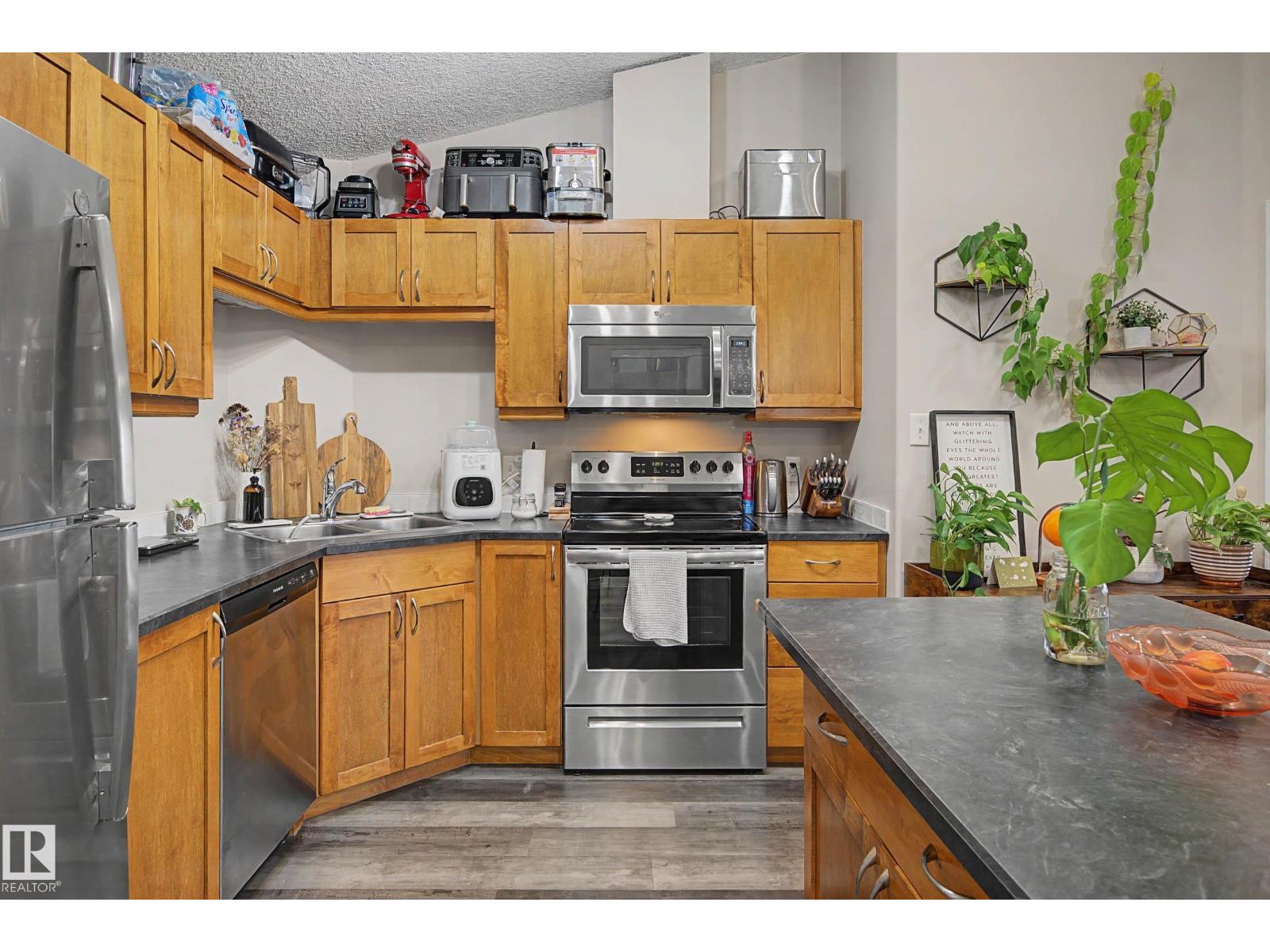 #1410 7339 SOUTH TERWILLEGAR DR NW - 7