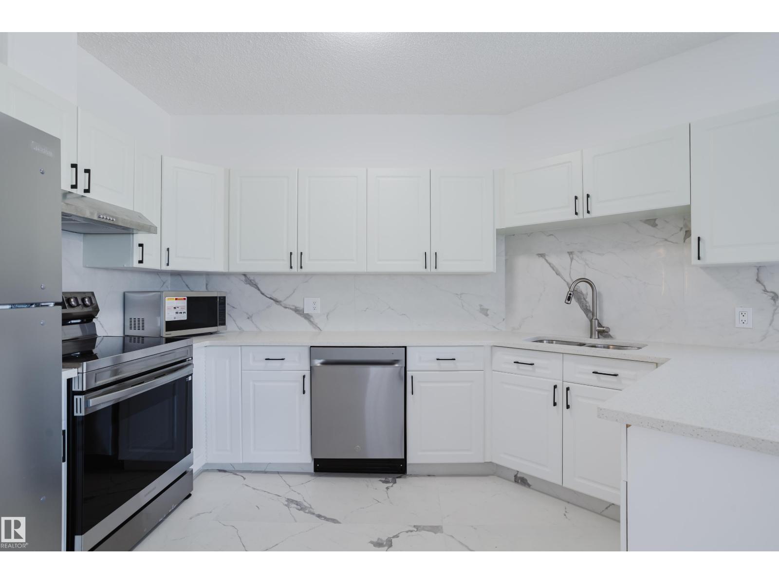 #703 9919 105 ST NW - 10