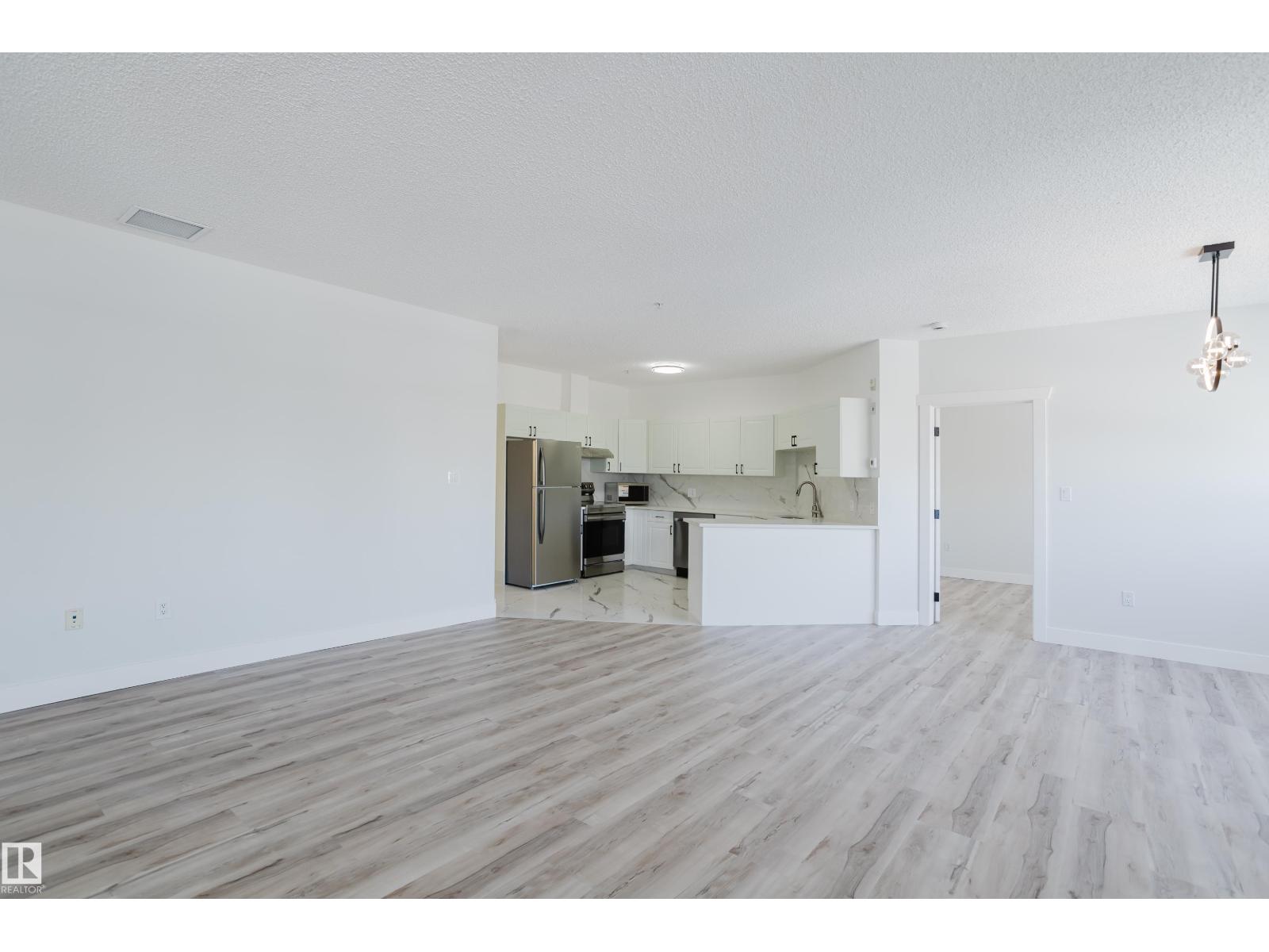#703 9919 105 ST NW - 18
