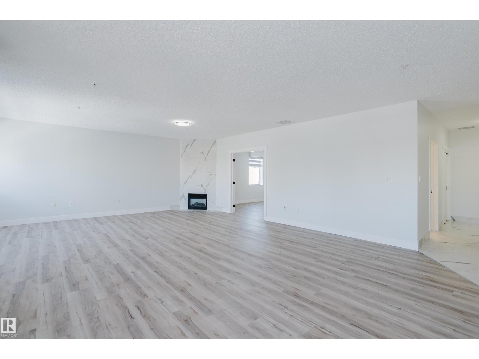 #703 9919 105 ST NW - 23