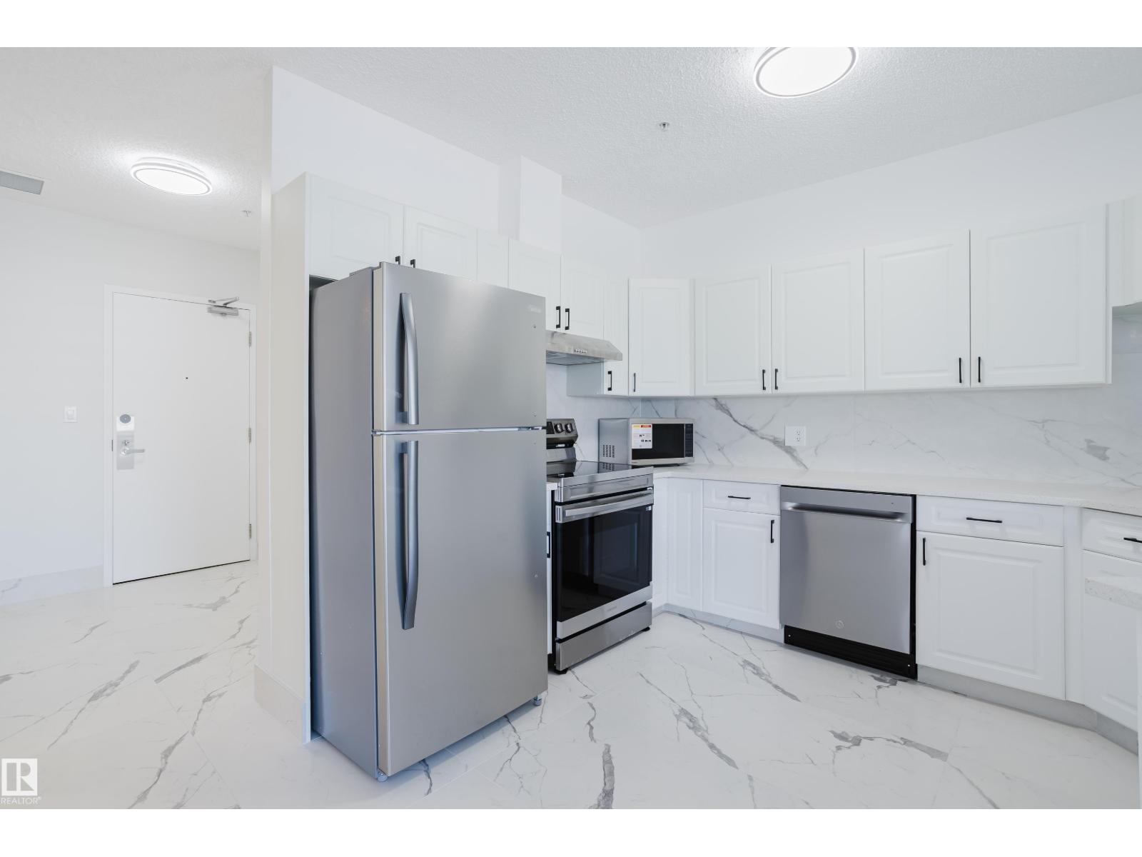 #703 9919 105 ST NW - 9