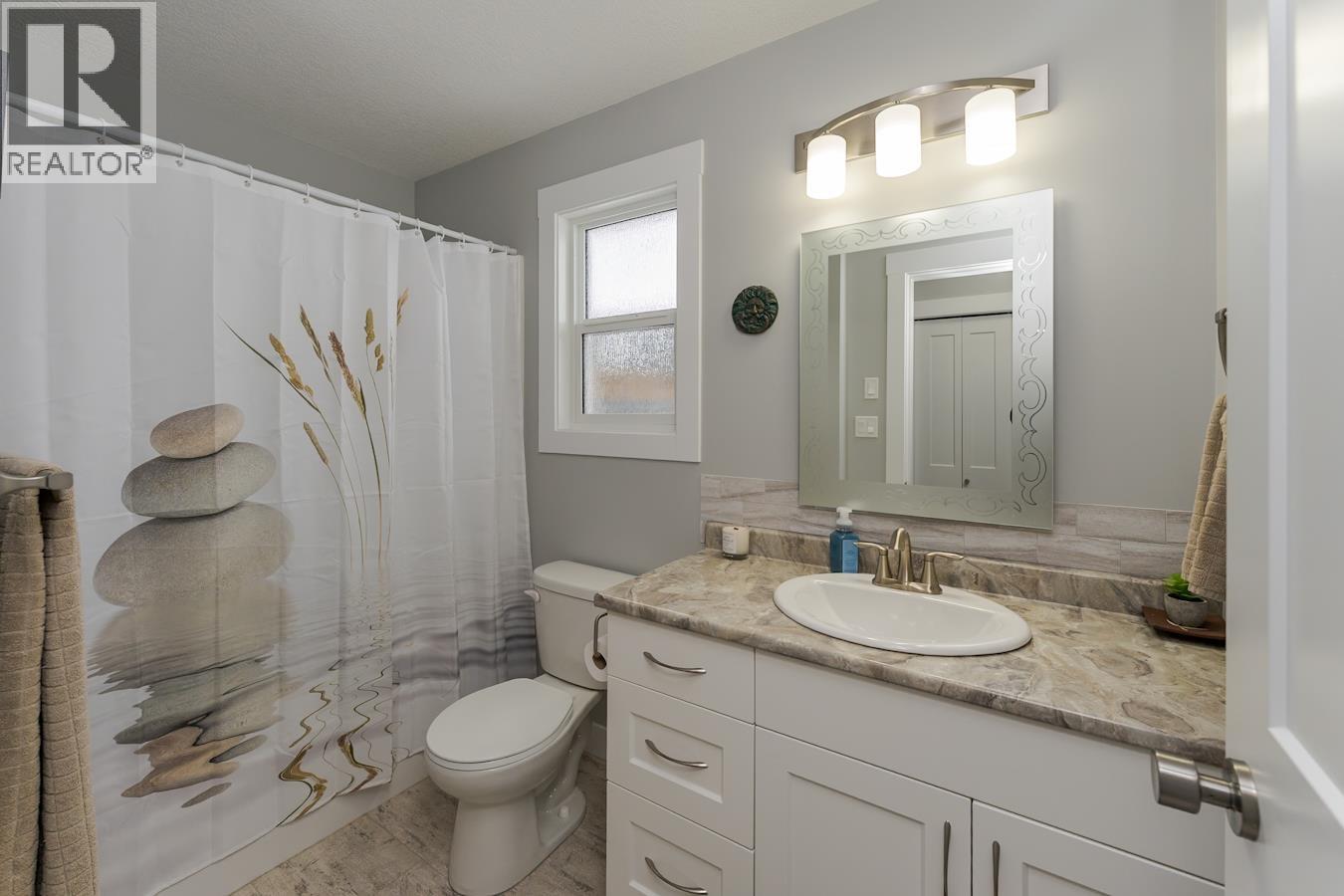 9060 TATLOW PLACE - 9