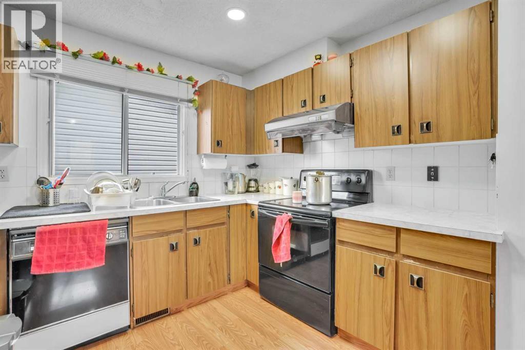 Single Family House 4 Level for Sale in  Falshire Close NE Falconridge Calgary 