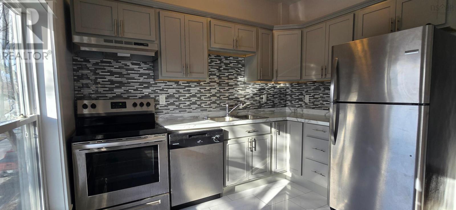 Property 11 of 19 of 2055,2059,2061 North Park Street