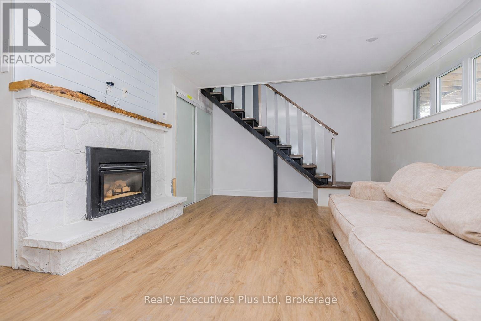 basement rec room with walkout to the pool