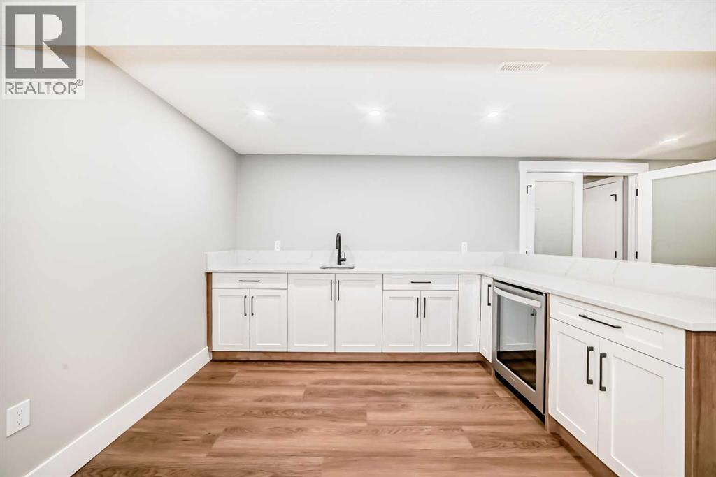 Single Family House Bungalow for Sale in  Lake Twintree Drive SE Lake Bonavista Calgary 