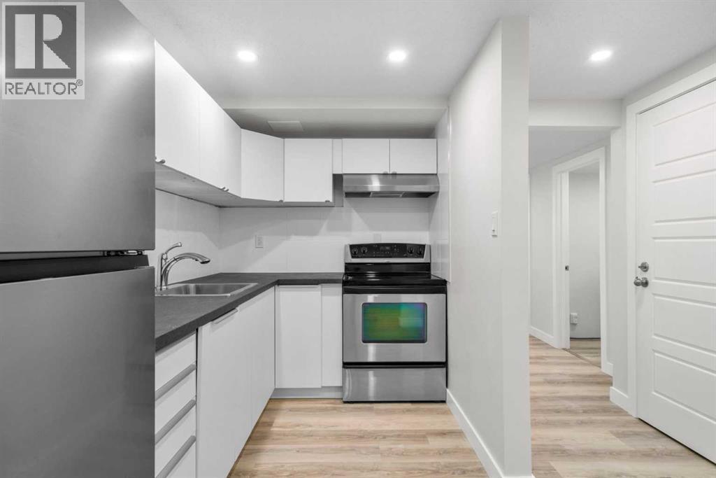 Single Family House Bi-level for Sale in A  Avenue SW North Glenmore Park Calgary 