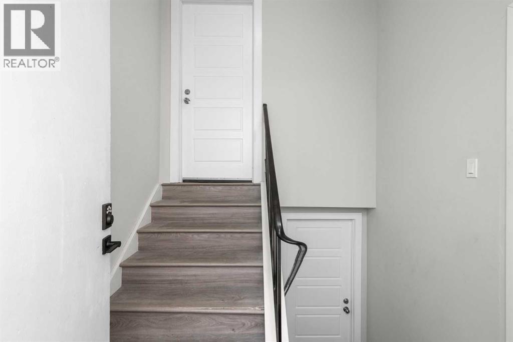 Single Family House Bi-level for Sale in A  Avenue SW North Glenmore Park Calgary 