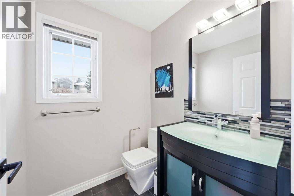 Single Family House 4 Level for Sale in  Kingsland Villas SW Kingsland Calgary 