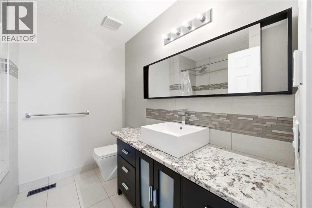 Single Family House 4 Level for Sale in  Kingsland Villas SW Kingsland Calgary 