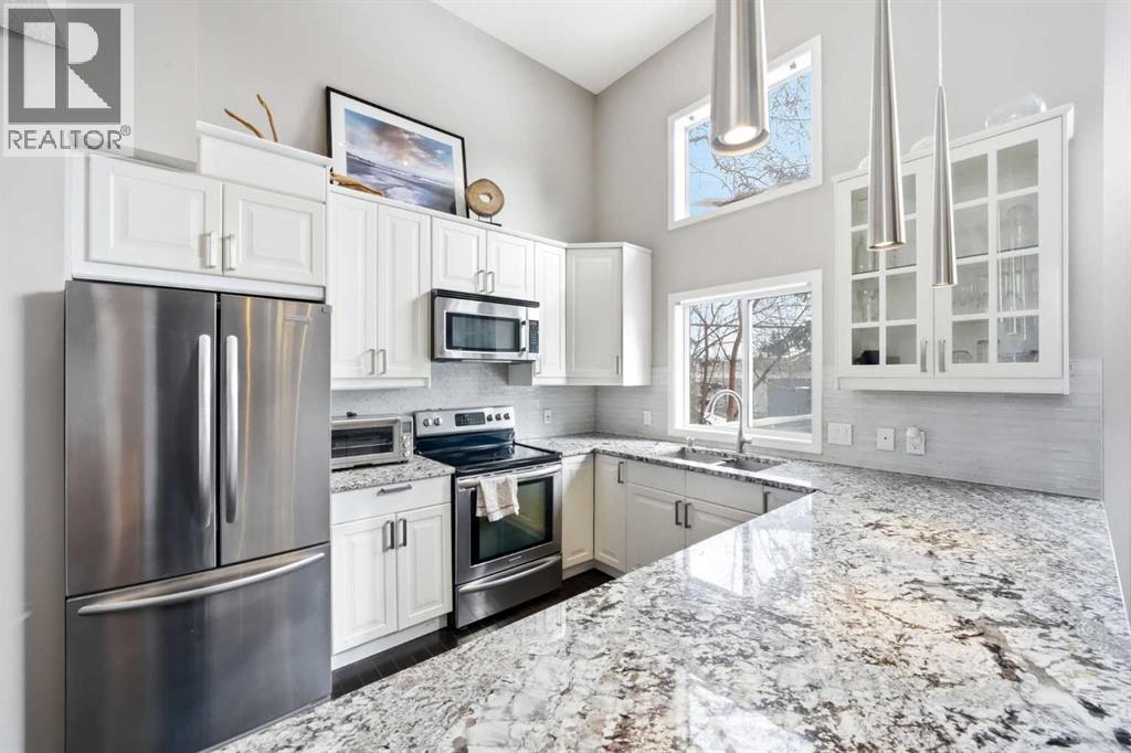 Single Family House 4 Level for Sale in  Kingsland Villas SW Kingsland Calgary 