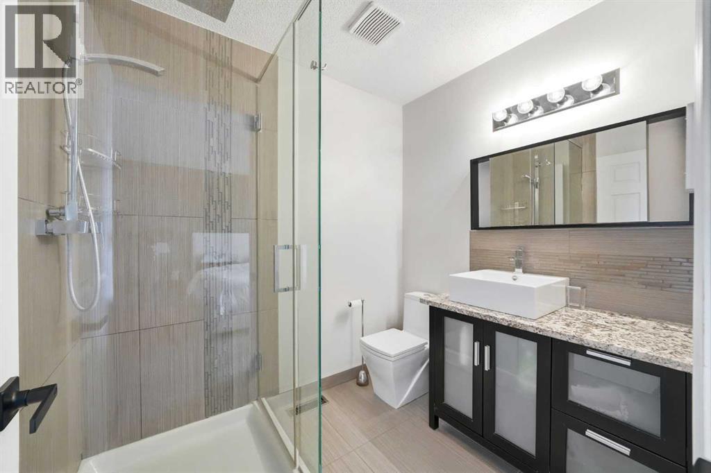 Single Family House 4 Level for Sale in  Kingsland Villas SW Kingsland Calgary 