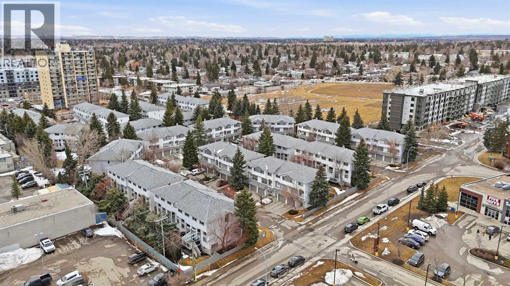 Single Family House 4 Level for Sale in  Kingsland Villas SW Kingsland Calgary 