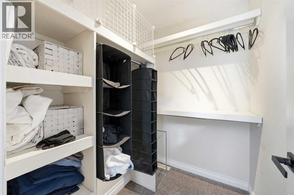 Single Family House 4 Level for Sale in  Kingsland Villas SW Kingsland Calgary 