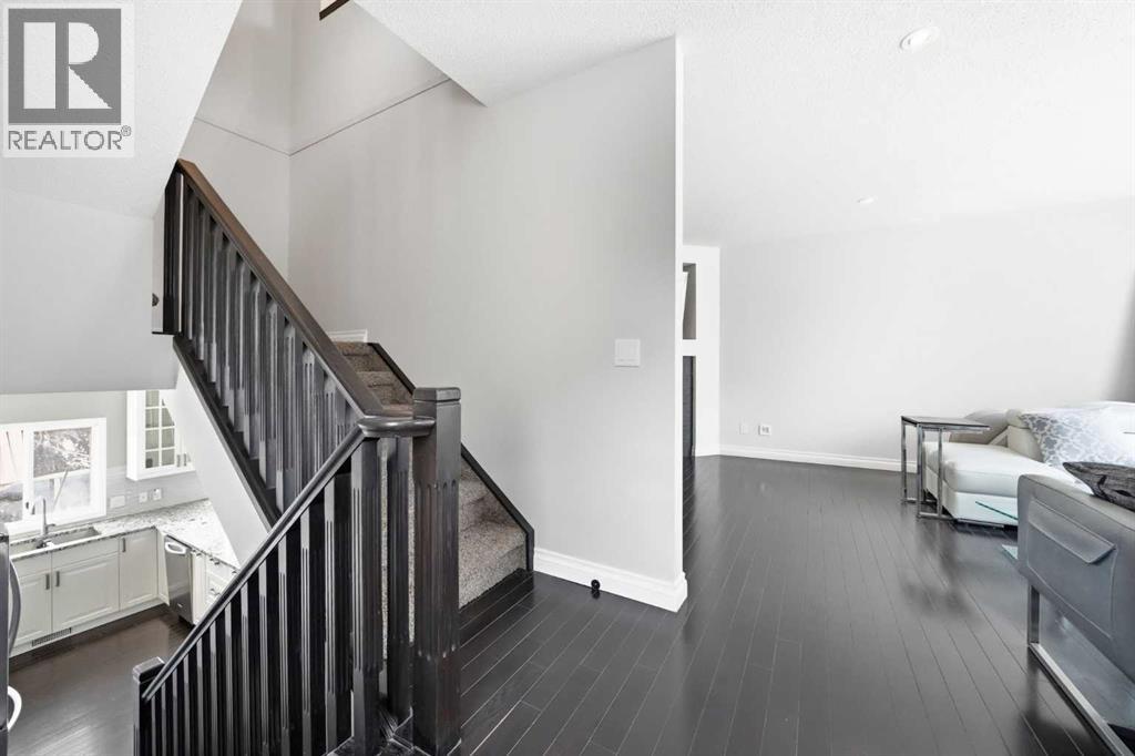 Single Family House 4 Level for Sale in  Kingsland Villas SW Kingsland Calgary 