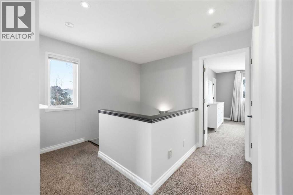 Single Family House 4 Level for Sale in  Kingsland Villas SW Kingsland Calgary 