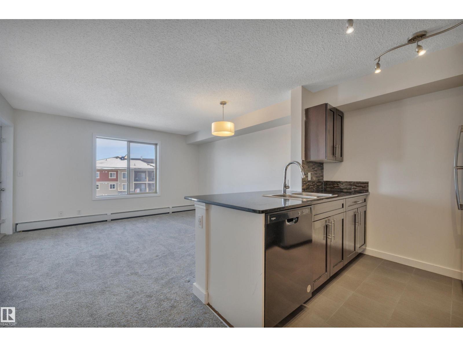 #415 12035 22 AV SW - 9