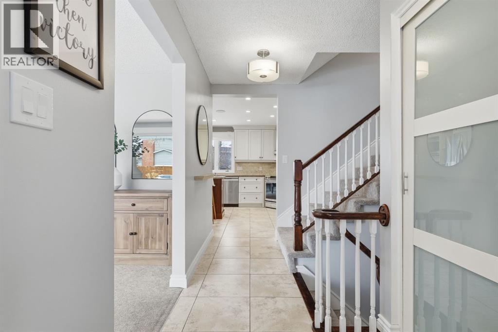 Single Family House 4 Level for Sale in  Lake Lucerne Drive SE Lake Bonavista Calgary 