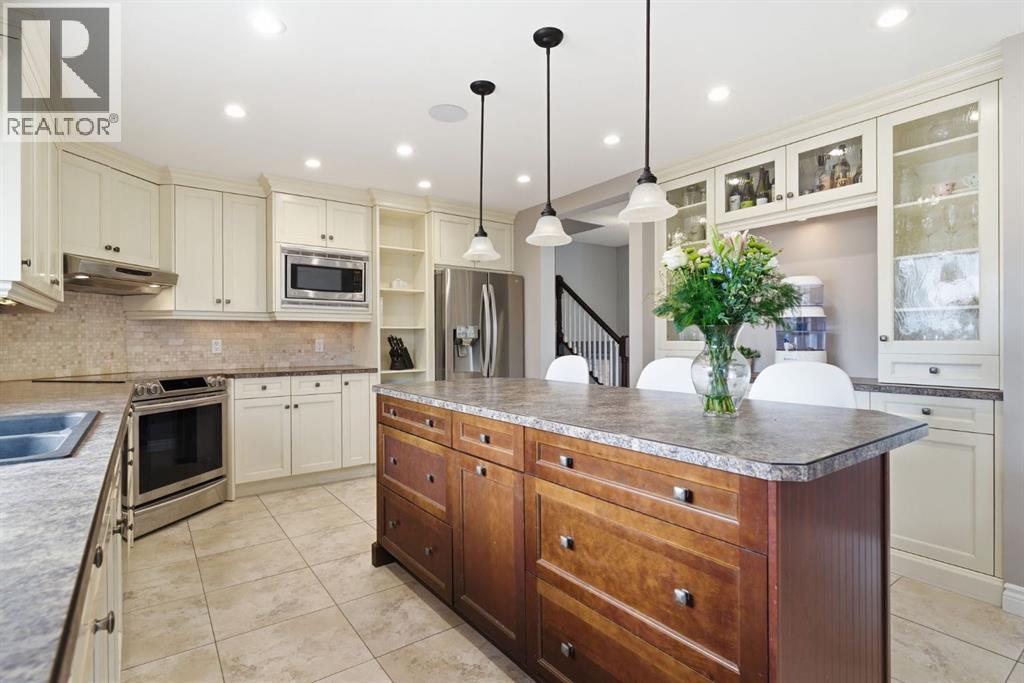 Single Family House 4 Level for Sale in  Lake Lucerne Drive SE Lake Bonavista Calgary 