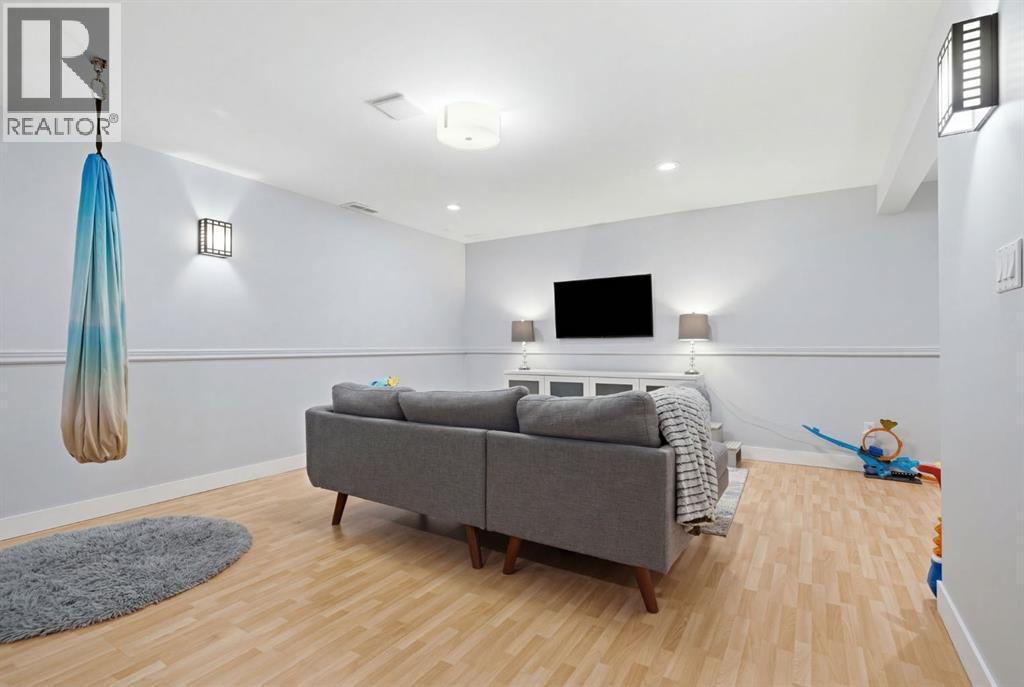 Single Family House 4 Level for Sale in  Lake Lucerne Drive SE Lake Bonavista Calgary 